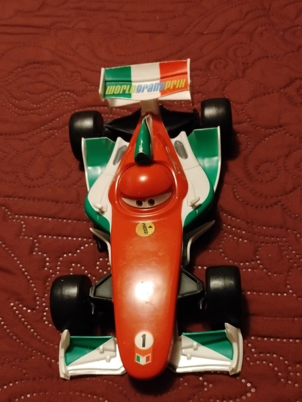 Disney Green, White & Orange World Grand Prix Race Car Toy